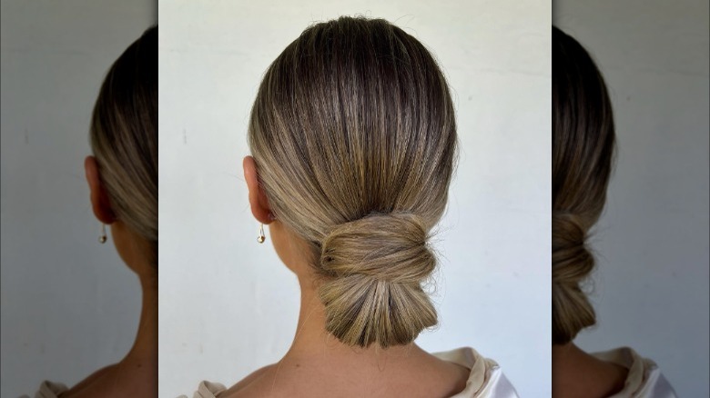 Chignon hairstyle with hair wrap detail