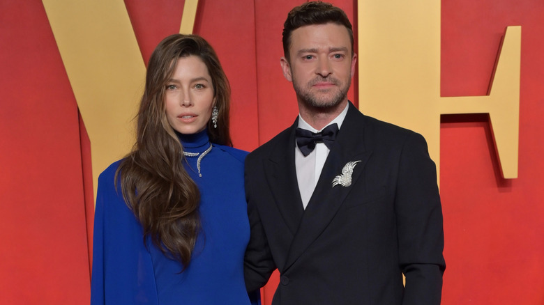 Jessica Biel and Justin Timberlake are photographed side by side on a red carpet