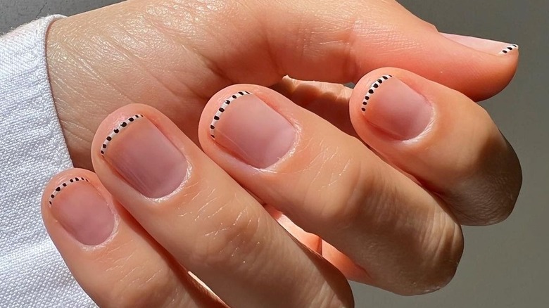 french manicure with black stripes