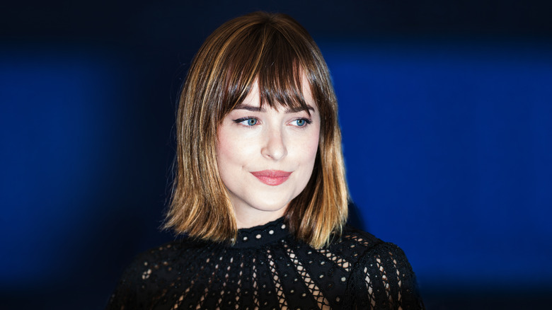 dakota johnson with cropped hair bangs