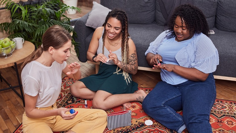 women doing their nails
