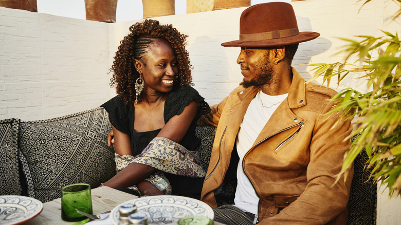 A couple on a date making eye contact
