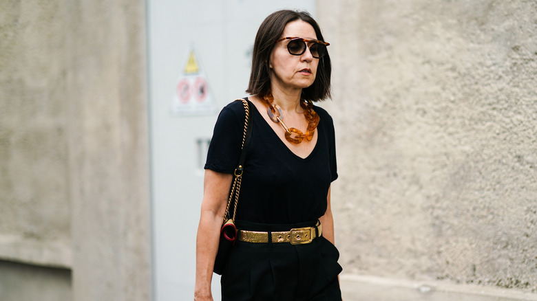 woman wearing tortoiseshell accessories