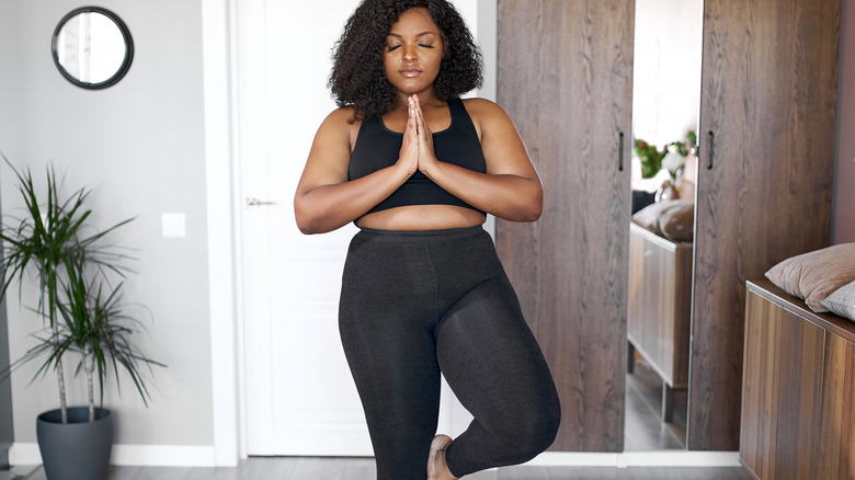 Girl exercising in leggings