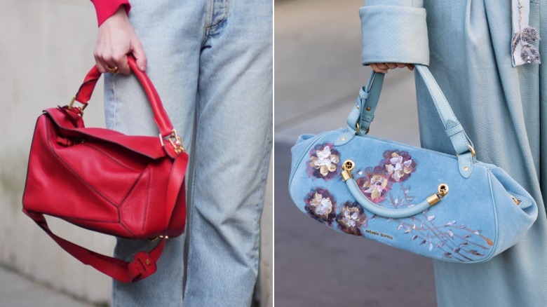 One woman carries a red handbag, while the other carries an embellished blue one