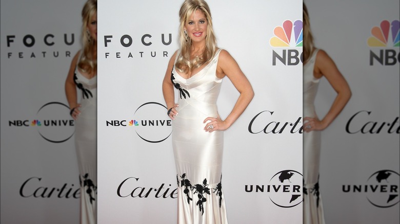 Kim Zolciak white dress pink lipstick