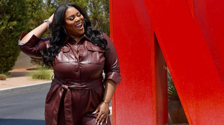 Nina Parker wearing her own design