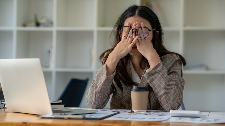 woman stressed at computer