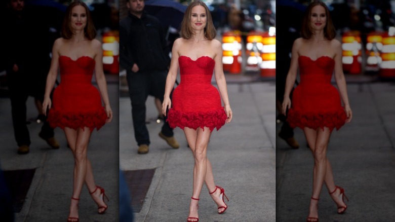 Natalie Portman smiles in a red dress