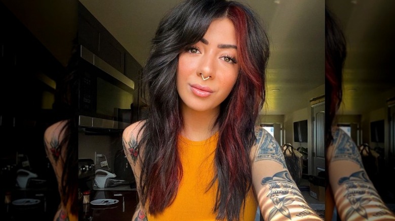 Woman with shag taking selfie