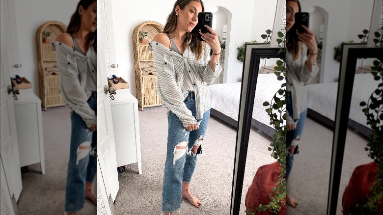 woman wearing half-tucked oversized shirt