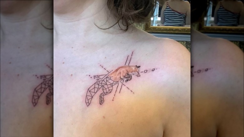 geometric fox collarbone tattoo