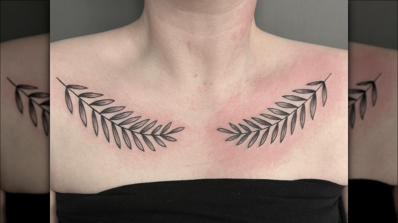 woman with leafy collarbone tattoo