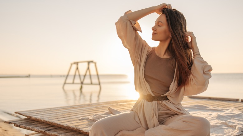 woman with eyes closed