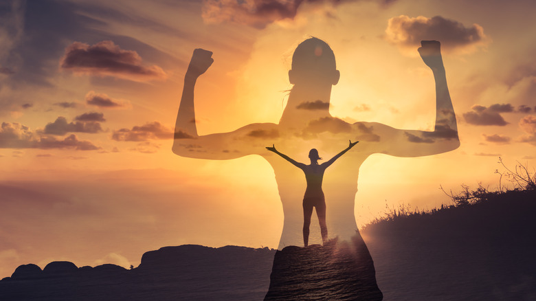 woman flexing muscles