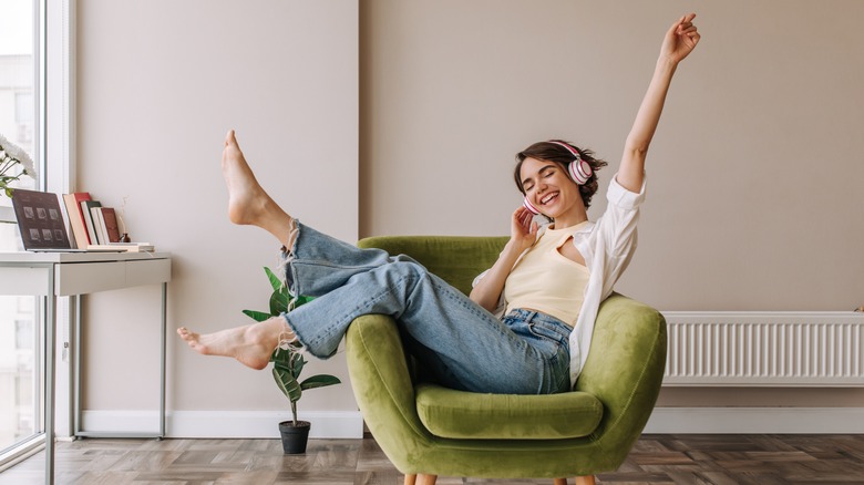 woman smiling on couch