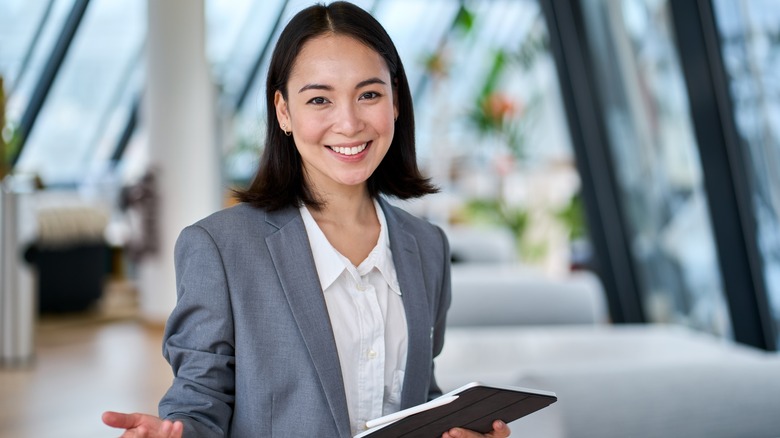 woman in suit smiling