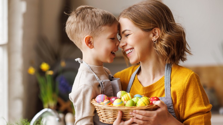woman smiling with child