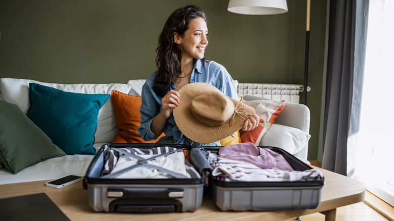 woman traveling with luggage