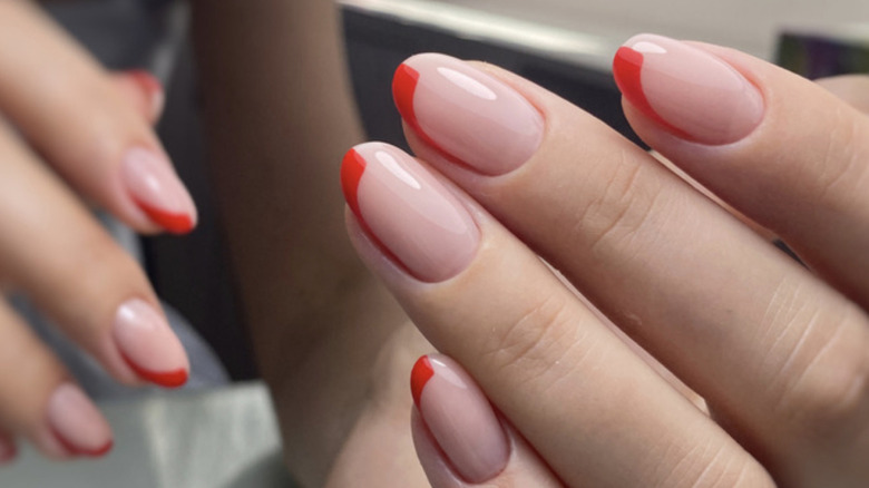 half red half skintone manicure