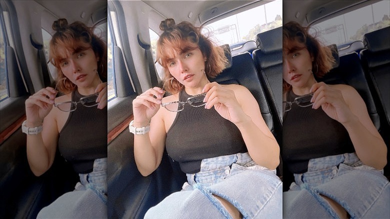 woman with french bob bangs