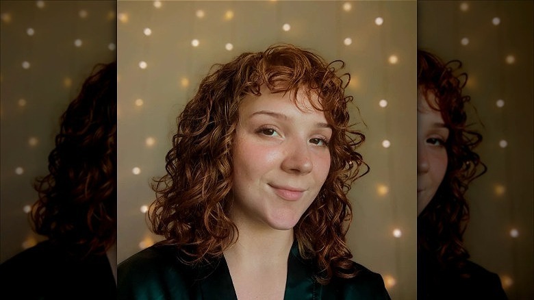 woman with short curly hair