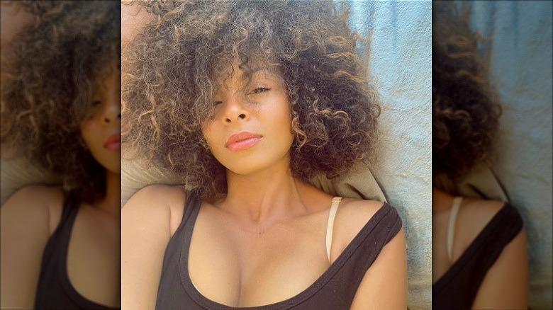 woman with short curly bedhead hair