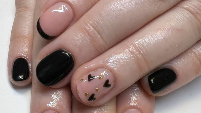 Black and skin-tone nail art manicure