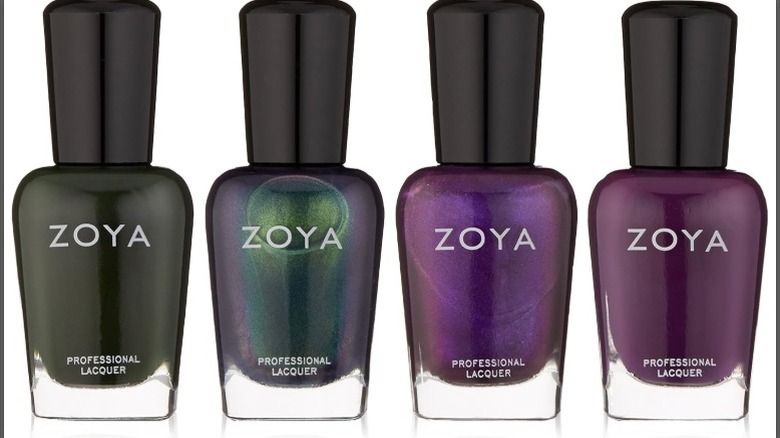 Four bottles of Zoya nail polish