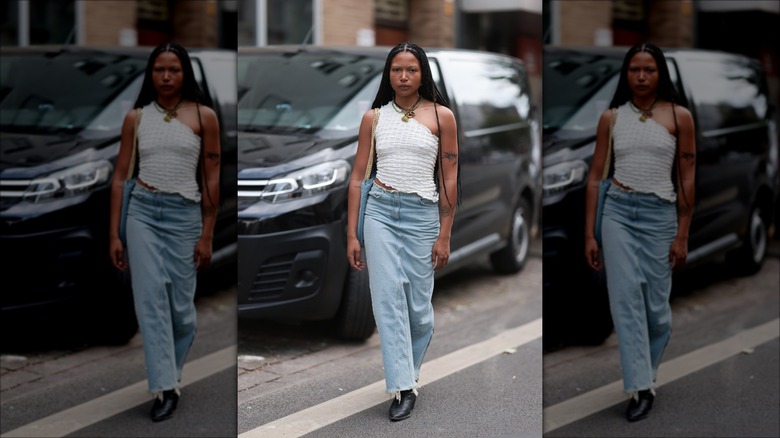 woman wearing denim maxi skirt