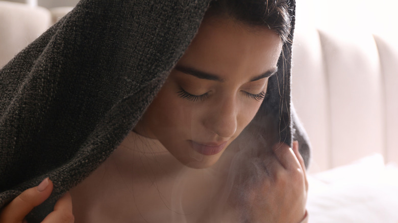 woman steaming face