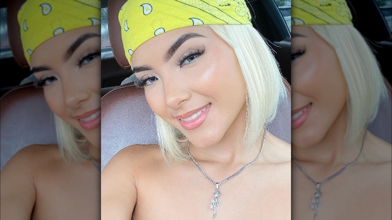 Woman wearing silver necklace 