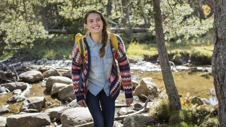Woman hiking in forest