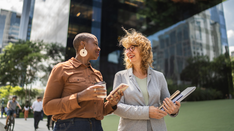 Women talking and walking