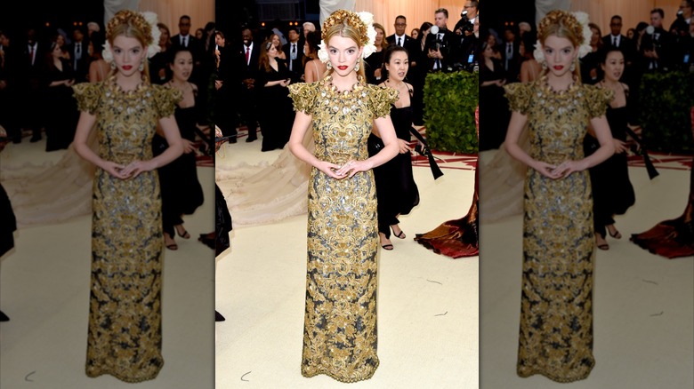 Anya Taylor-Joy in a heavy lace gown at the 2018 Met Gala.
