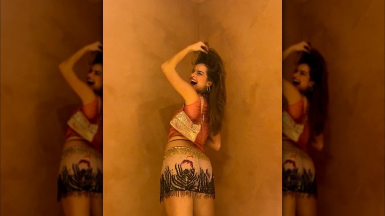 Addison Rae wearing a sheer skirt.