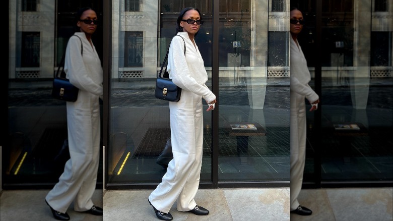 Girl wearing a quiet luxury look.