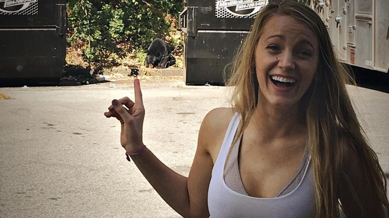 Blake lively pointing at a bear cub