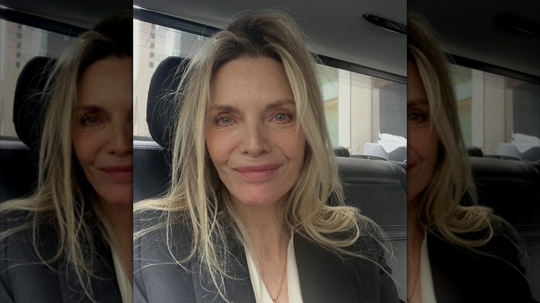 Michelle Pfeiffer goes makeup-free while in the back of a car