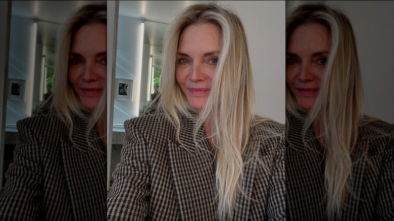 Michelle Pfeiffer wears a tweed blazer and no makeup