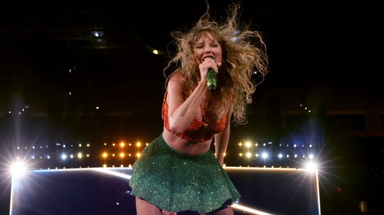 Taylor Swift performing in the rain for the Eras Tour