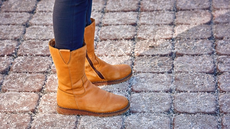 Woman wearing suede boots 
