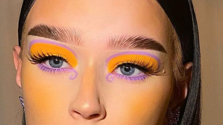 yellow and purple eye look