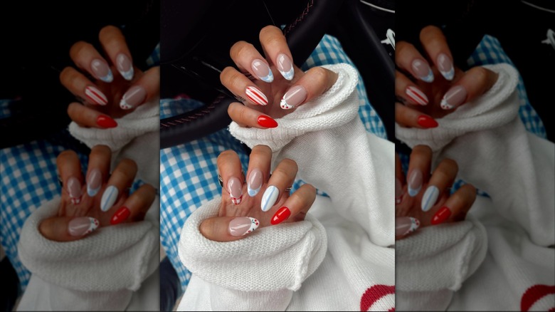 Nails with different designs on each finger.