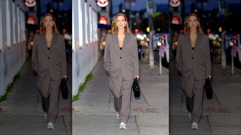 gray suit with sneakers