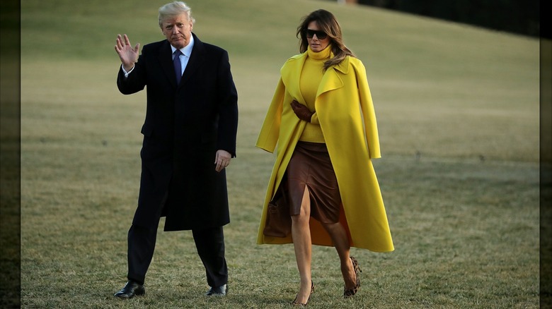 U.S. President Donald Trump (L) and first lady Melania Trump return to the White House after a day trip to Cincinnati, Ohio, February 5, 2018 in Washington, DC (2018)