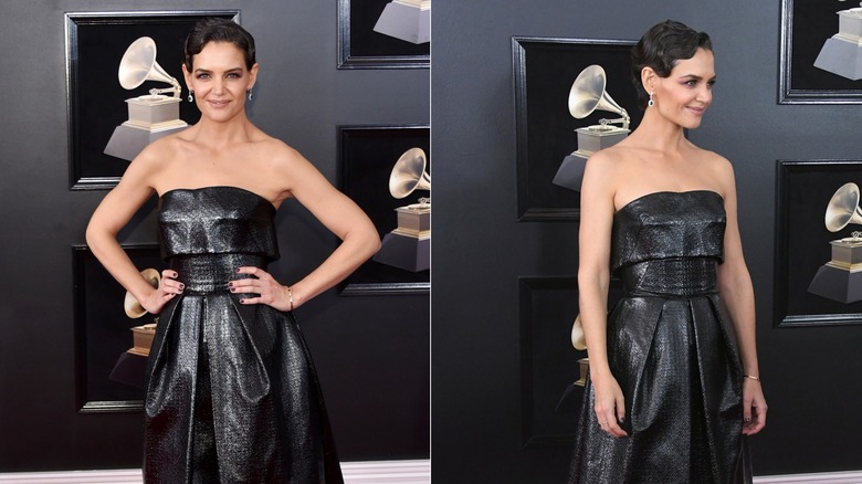 Katie Holmes smiles for photos in a black dress at the 2018 Grammy Awards