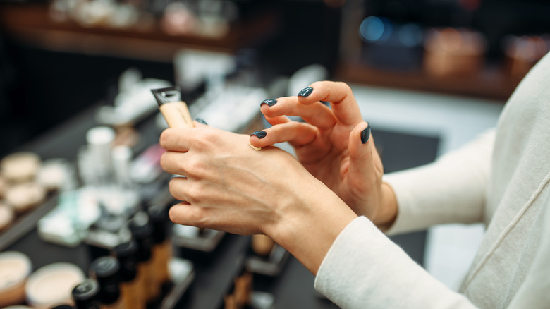 woman shopping for foundation