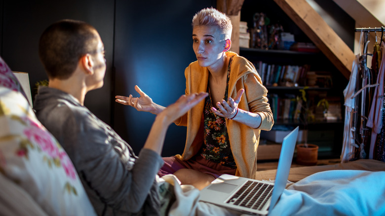 Couple arguing in bedroom