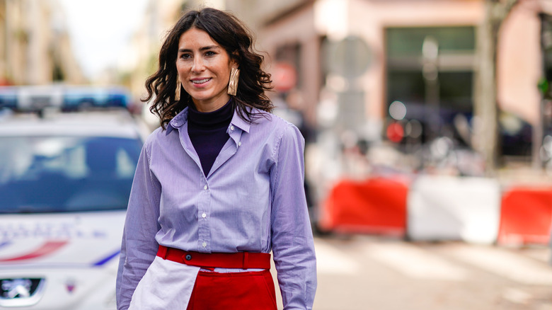 woman with tucked button up